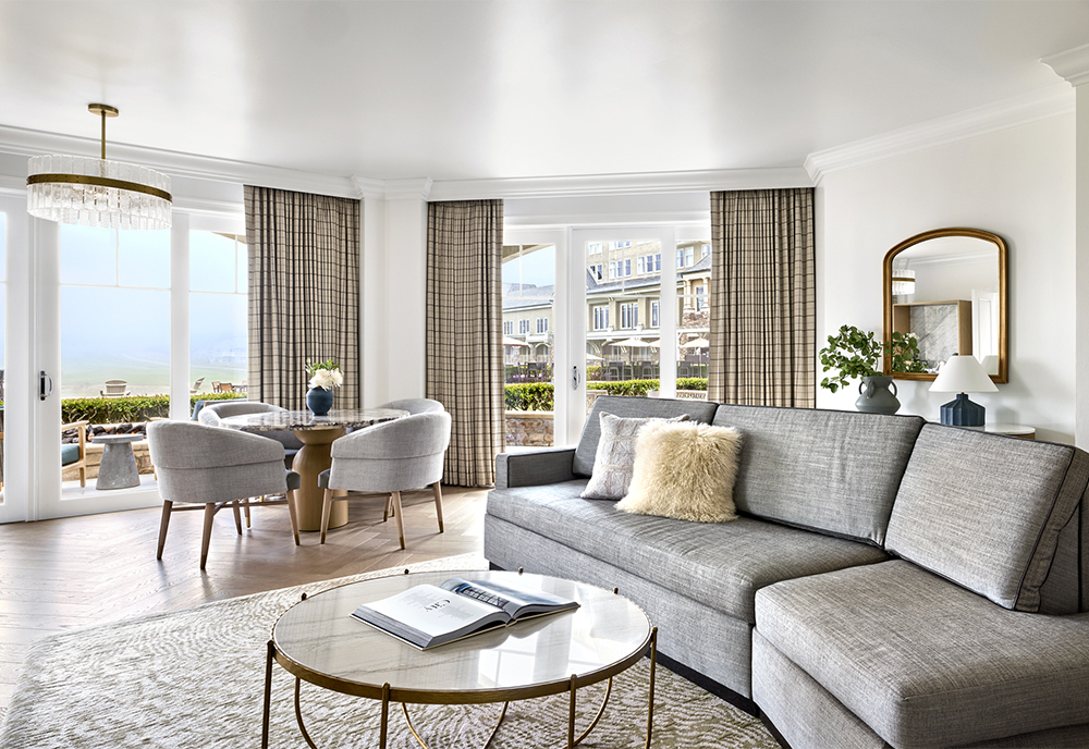 Interior living quarters looking out windows with alot of natural light.