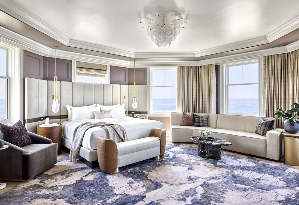 Luxury guest suite with surrounded by windows with alot of natural light.