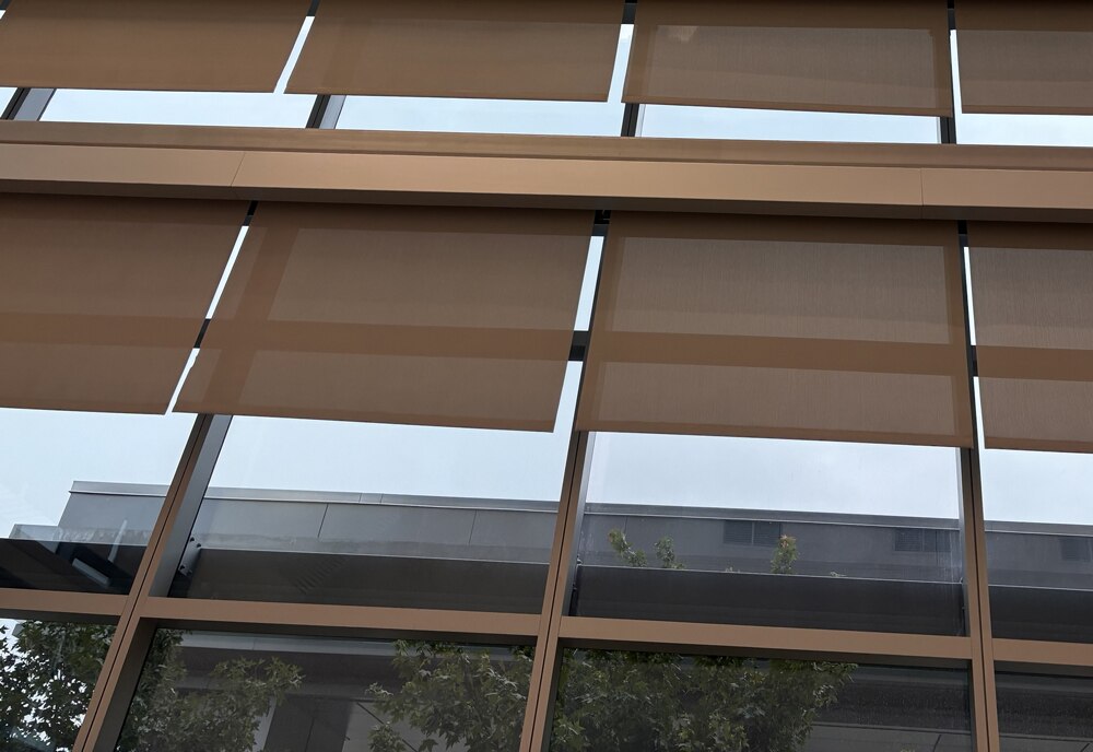 Two tiered shades of the University of Texas Brain and Cancer Center.