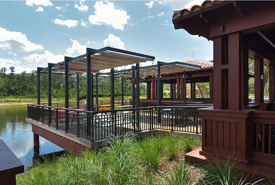 Retractable free standing patio deck pergola cover systems at Disney Four Seasons Hotel