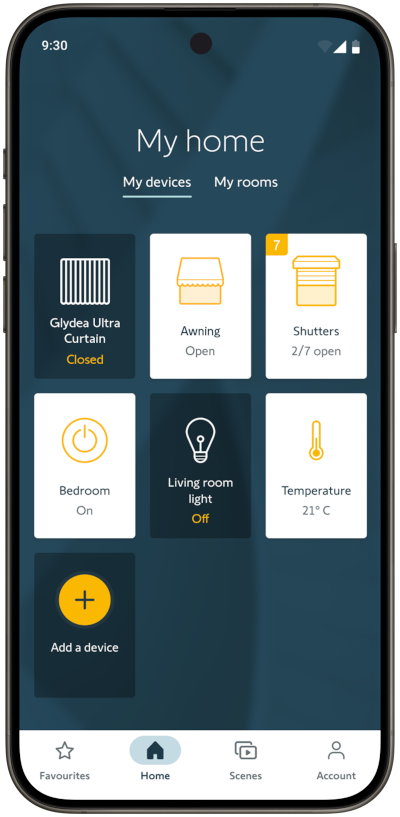 Android screenshot of the TaHoma by Somfy app showing the new accessibility improvements with Awning, Shutters, Bedroom and Temperature devices actively selected.